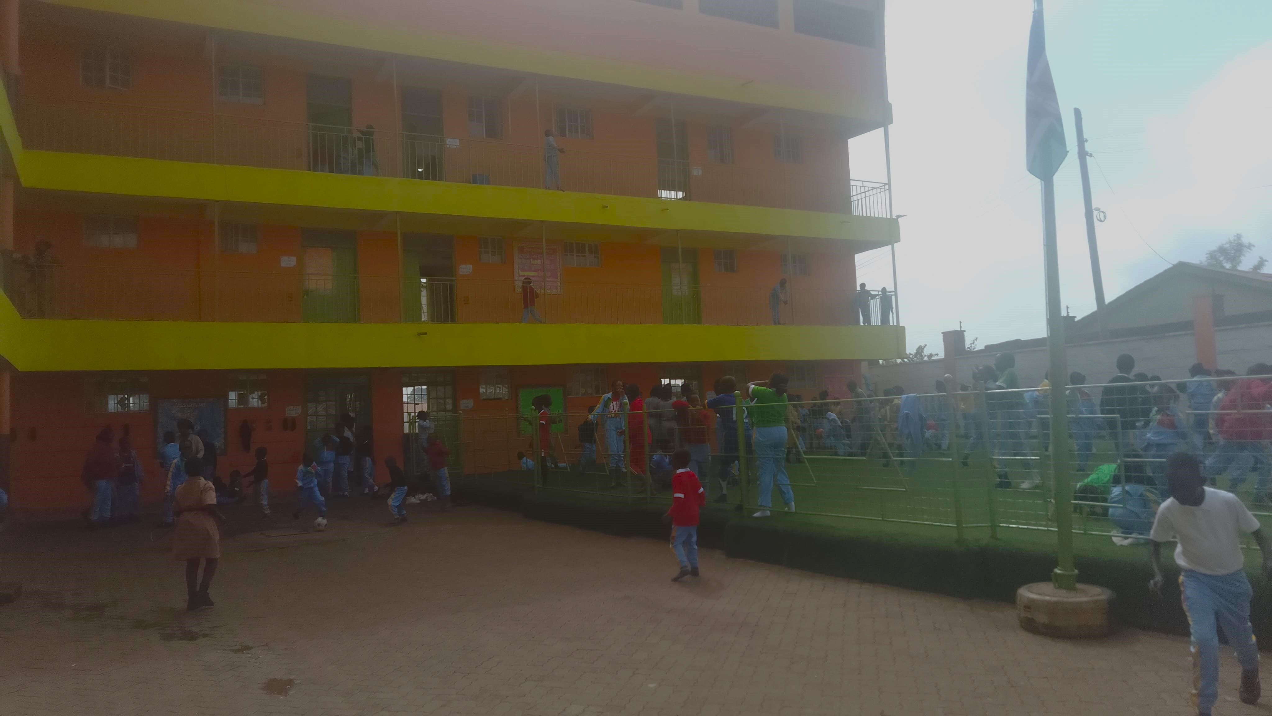 Daisy School pupils playing in the school compound